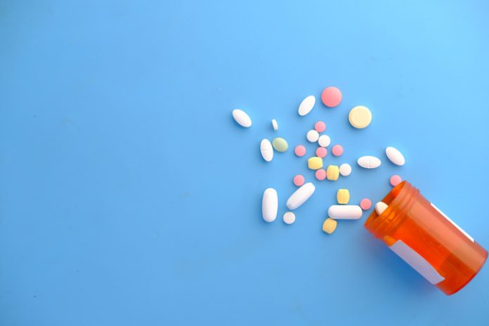 Close up of many colorful pills and medicine.