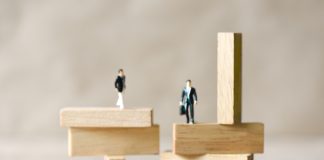 Risk business and SME concept, business man stands on wooden blocks. risk control and managment idea