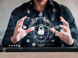 Businessman holding shield protect icon. Protection network security computer and safe your data concept, lock symbol, concept about security, cybersecurity and protection against dangers.
