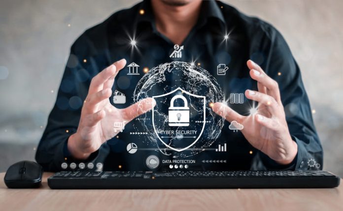 Businessman holding shield protect icon. Protection network security computer and safe your data concept, lock symbol, concept about security, cybersecurity and protection against dangers.