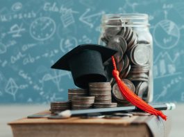 MBA cap on stack of coins