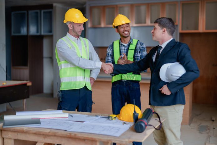 Engineers shaking hands after hiring