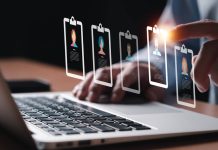 Entrepreneur using electronic devices hiring