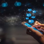 Young woman using smart phone, social media marketing , networking