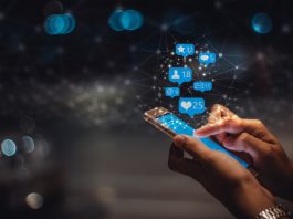 Young woman using smart phone, social media marketing , networking