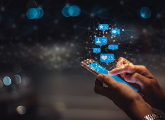 Young woman using smart phone, social media marketing , networking