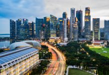High Angle View Of Road Amidst Buildings In City Against Sky. Urban living in singapore