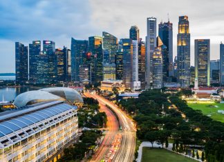 High Angle View Of Road Amidst Buildings In City Against Sky. Urban living in singapore